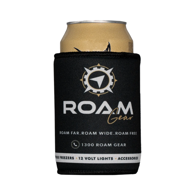Roam Gear black stubby cooler front view around a can, with the white and gold logo facing forward.