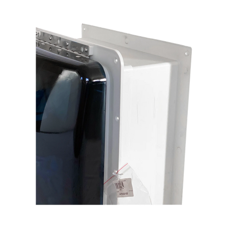 TRA 12V manual roof vent hatch corner close up with the lid edge, hinge and white mounting flanges.