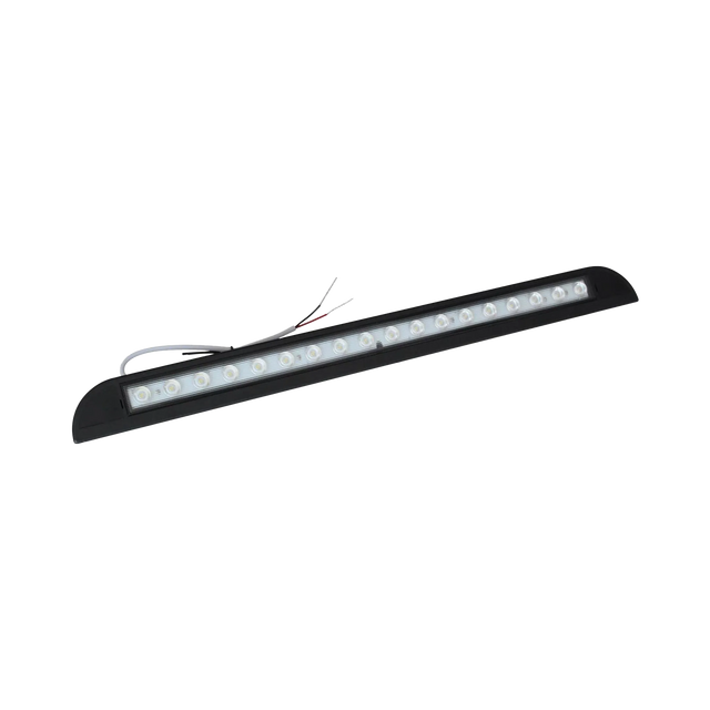 TRA 900 lumen 12V black LED awning light angled view with a long clear lens and wiring behind the housing.